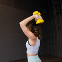 Woman Exercising with Body-Solid Neoprene Dumbbells